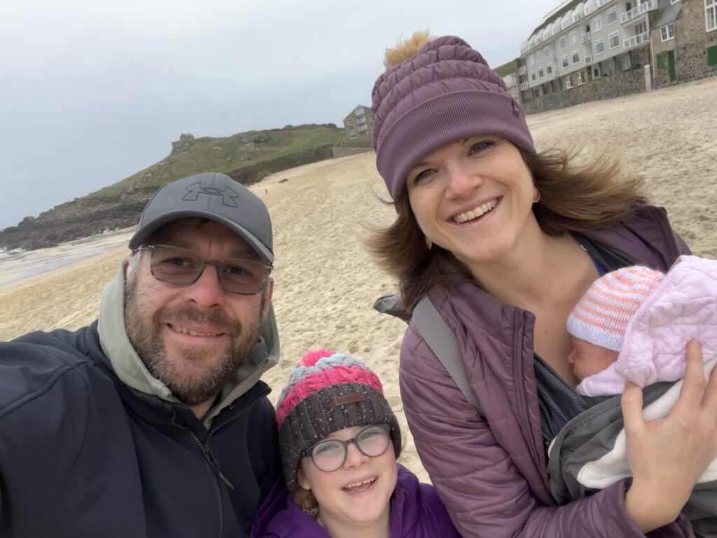 family on beach in St. Ives